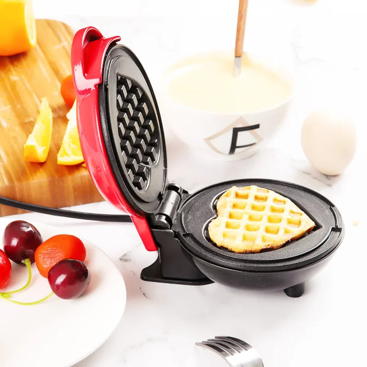 Showlu Smart General Mini Electric Waffle Maker with non-stick surface and 350W power for compact, easy waffle making.