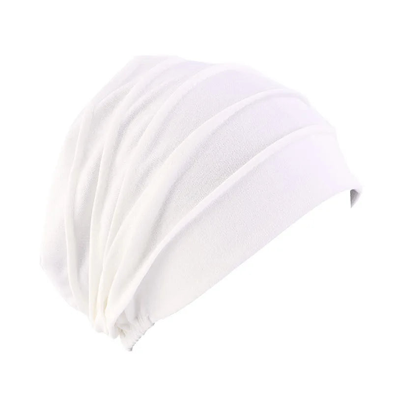 Solid color women's turban hat from Showlu Fashion Store, elastic hair loss chemo cap with inner lining for comfortable wear