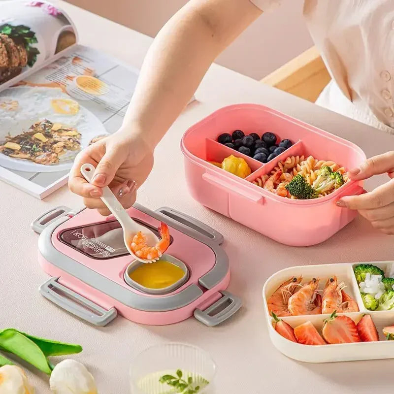 Reusable portable lunch box with wheat straw compartments, handle, and snack containers for meal storage and food transport.