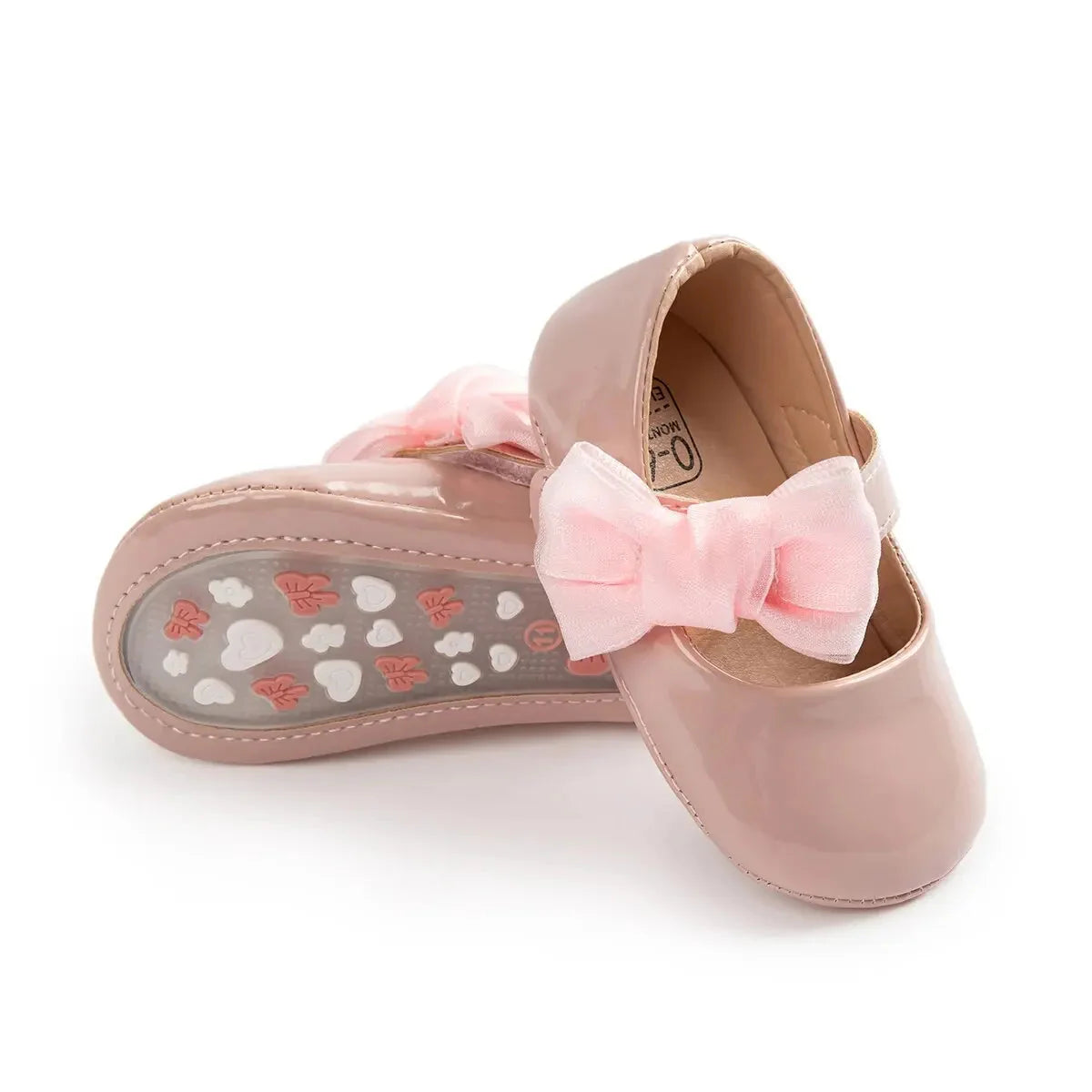 Baby girl PU leather bowknot shoes by Meckior with non-slip soles, designed for first walkers, in a cute pink color.
