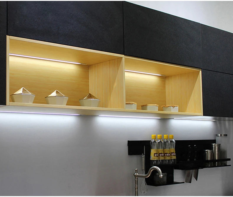 Showlu Smart General CHNAITEKE motion sensor LED light mounted on wall, illuminated in a modern home setting