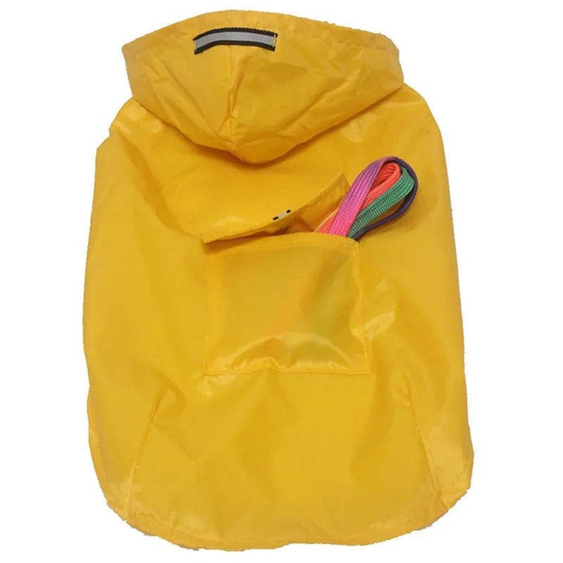 A yellow hooded dog raincoat with a reflective stripe and a pocket containing a colorful leash.