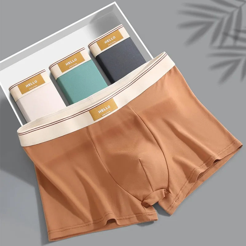 Breathable men's boxer shorts made of milk silk with a comfortable fit, featuring a sexy design and natural airflow for everyday wear.