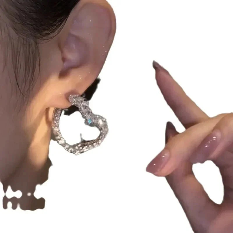 SHOWLU FASHION Zircon leaf stud earrings featuring Korean-style copper jewelry with sparkling zircon stones.