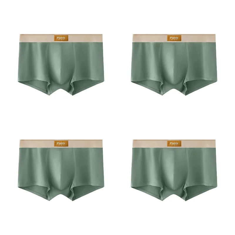 Four pairs of Showlu Fashion men's cotton boxer shorts in large sizes, breathable and comfortable men's underwear with sporty fit.