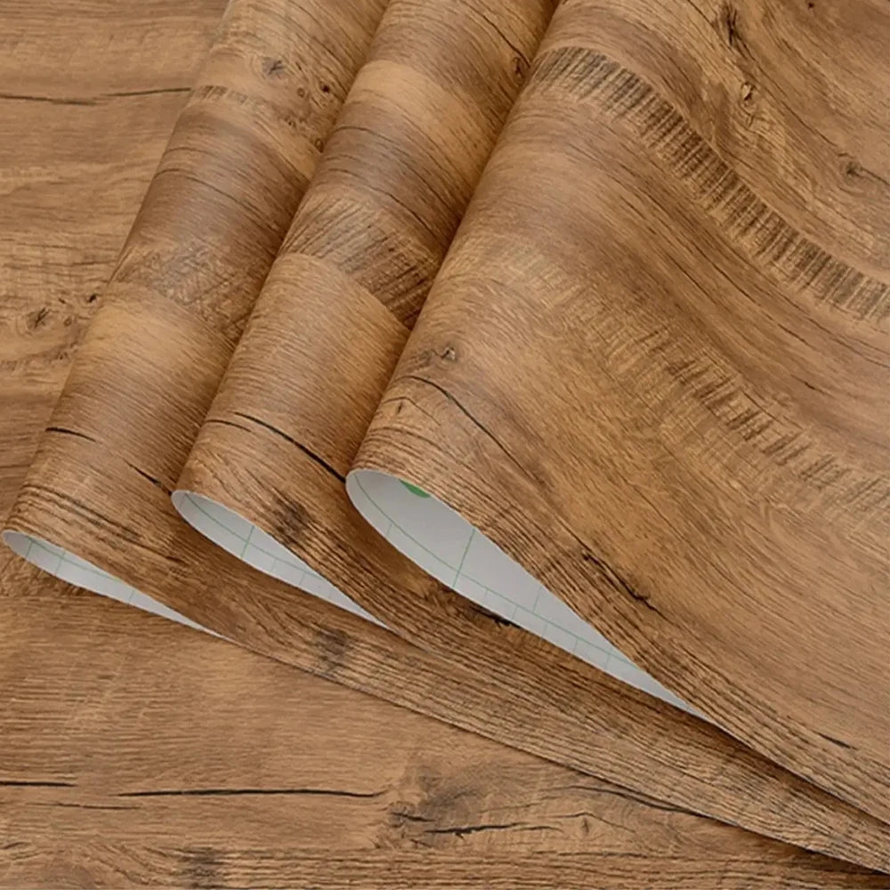 PVC waterproof self-adhesive wallpaper with wood grain design, suitable for furniture, walls, and cabinets in home decor.