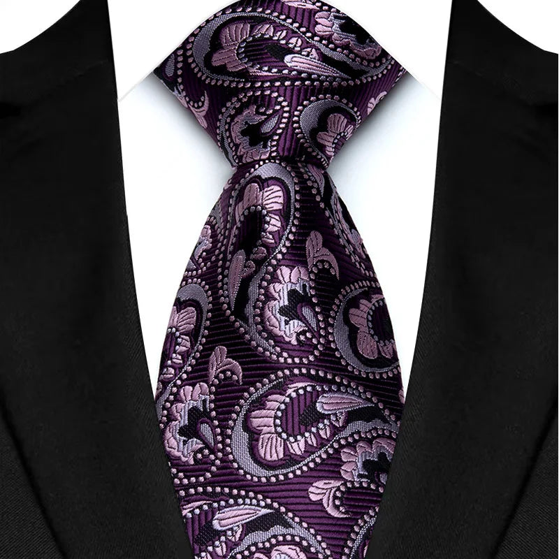 Purple men's necktie with floral plaid jacquard weave, suitable for business, wedding, or party attire.