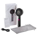 Showlu Smart General red light scalp massager comb with hair growth oil applied, designed to stimulate scalp and promote hair growth.