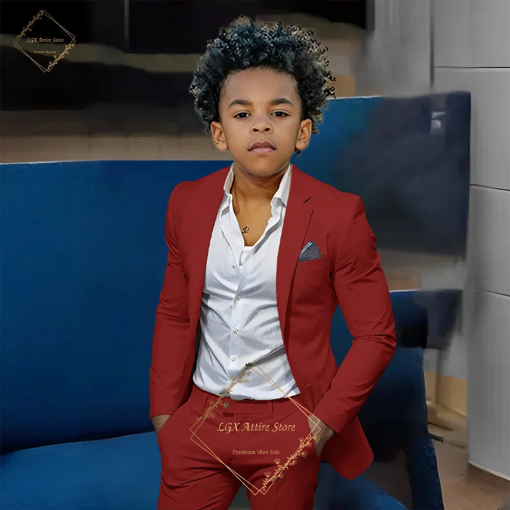 Orange boys' slim fit 2-piece suit by SHOWLU FASHION STORE, featuring a single-breasted twill jacket and matching trousers.