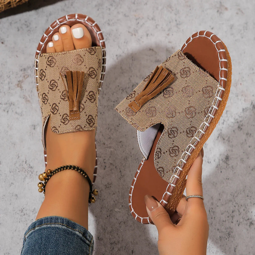 Women's fringe canvas slides by SHOWLU FASHION STORE featuring casual summer beach flat sandals with fringe details.