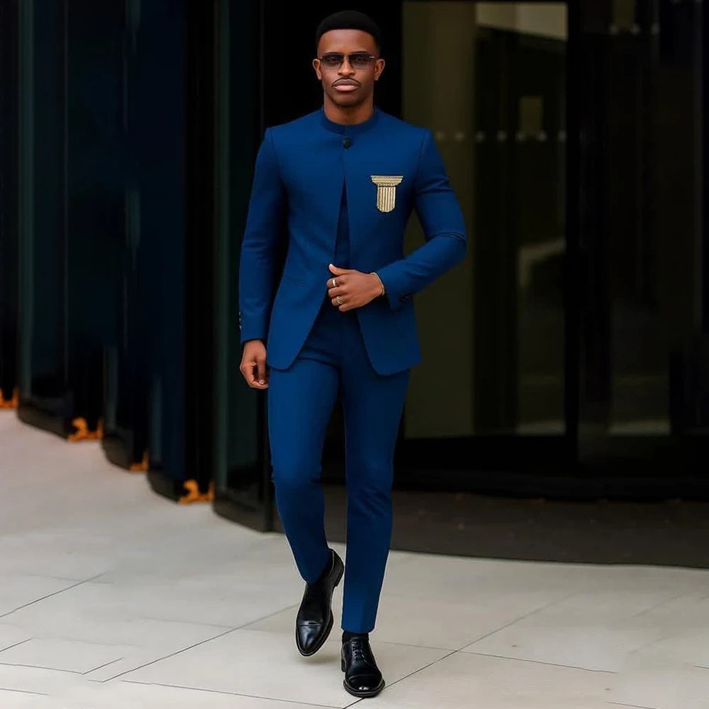 Elegant men's slim fit suit by Showlu Fashion, featuring a single-breasted jacket with stand lapel and matching pants.