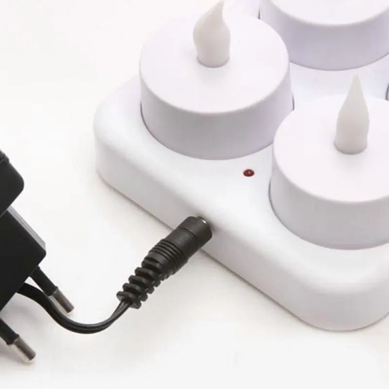 Set of Showlu Smart General LED rechargeable candles with flickering flame effect on a wooden surface.