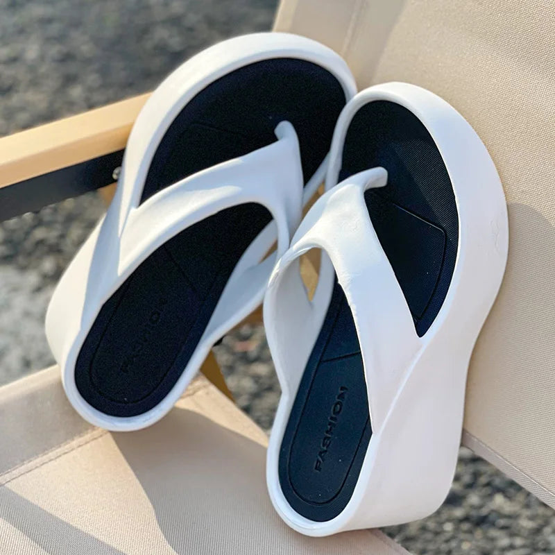 SHOWLU Women's platform wedge flip flops with thick EVA sole, summer sandals featuring a stylish and comfortable design.