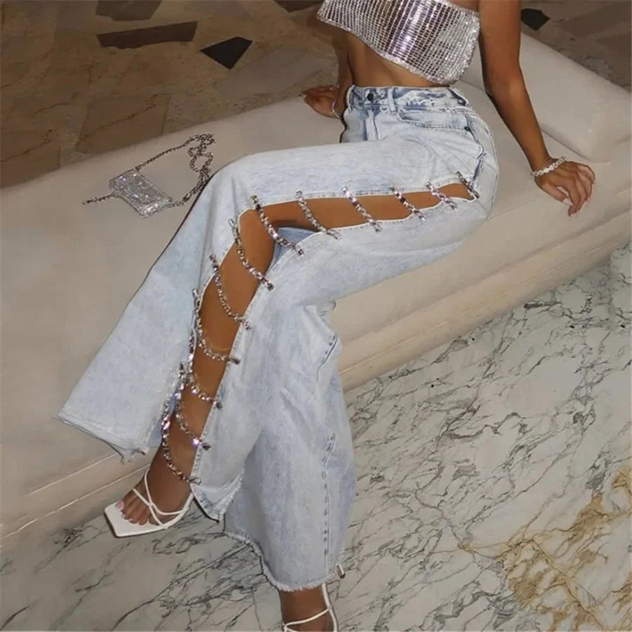 Showlu Women's high waist wide leg baggy denim jeans with crystal chain details, Y2K style, in a light blue wash.