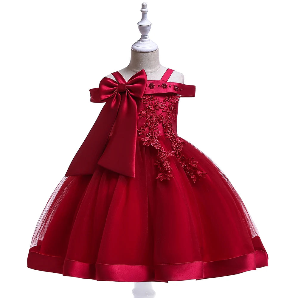 Elegant pink bow flower girl dress by Showlu Fashion Store featuring tulle fabric, suitable for parties, weddings, and special occasions.