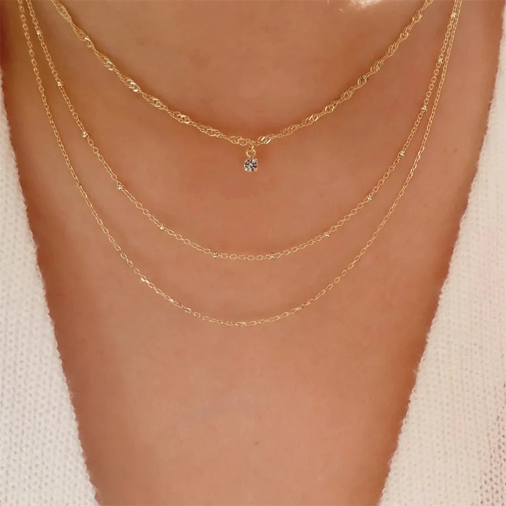 Vintage elegant round pearl pendant necklace for women, featuring multi-layer gold chain choker jewelry by Showlu Fashion.