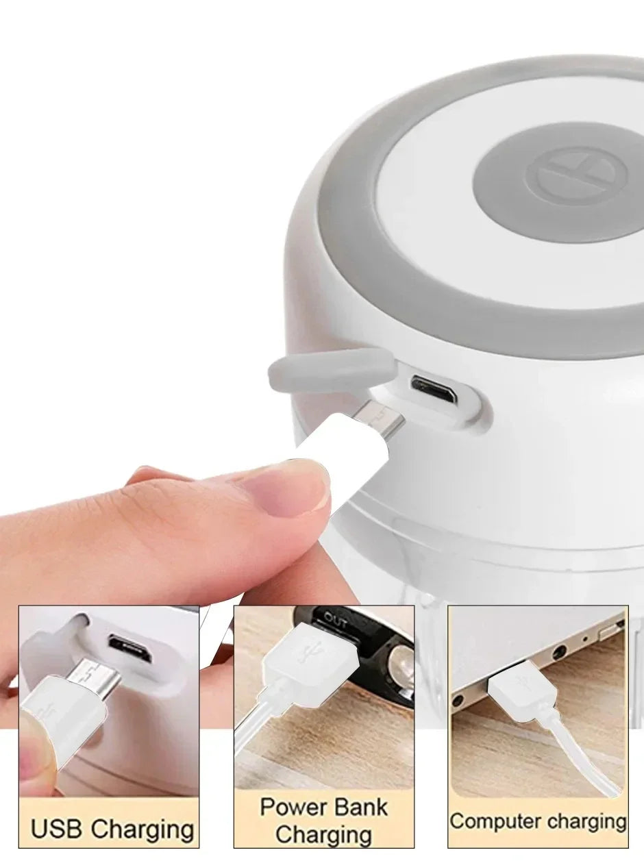 Mini electric garlic grinder by Showlu Smart General, showing compact design with stainless steel grinding chamber and push-button operation.