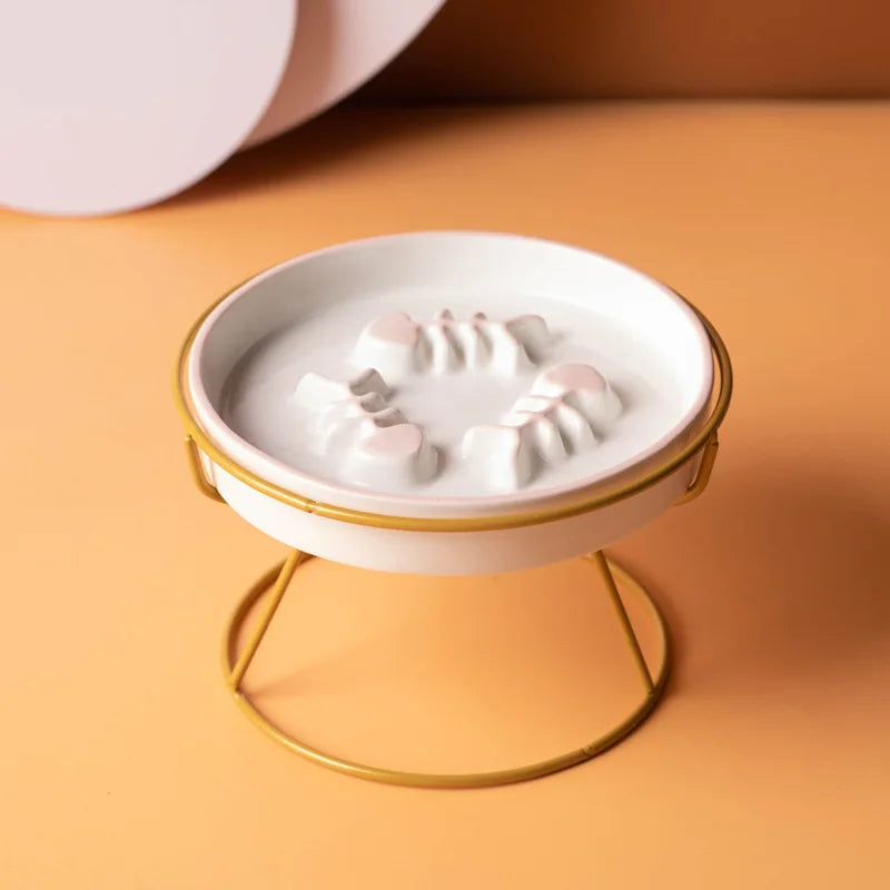 Ceramic cat bowl with high foot design from Showlu Fashion Store, anti-choking grain bowl for slow feeding and safety.