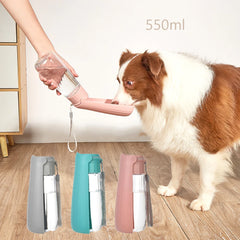 A person holds a portable 550ml dog water bottle for a dog to drink from, with three color options.