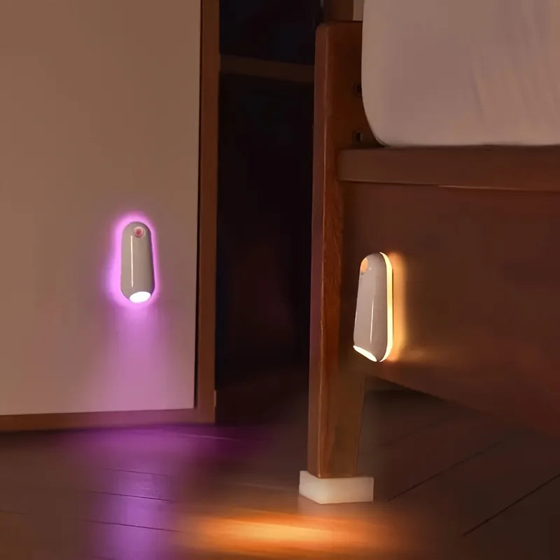 Showlu Smart General motion sensor mouse LED night light illuminating a dark space with soft, energy-efficient lighting.