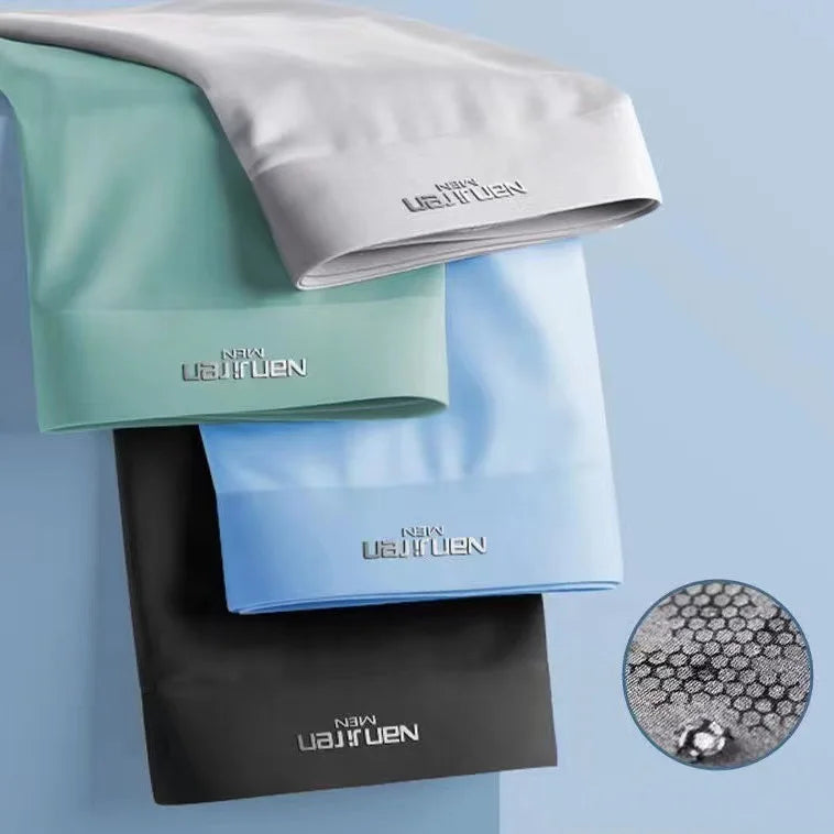 Set of four men's ice silk boxer shorts from Showlu Fashion, featuring breathable, thin U-convex underwear in assorted colors.