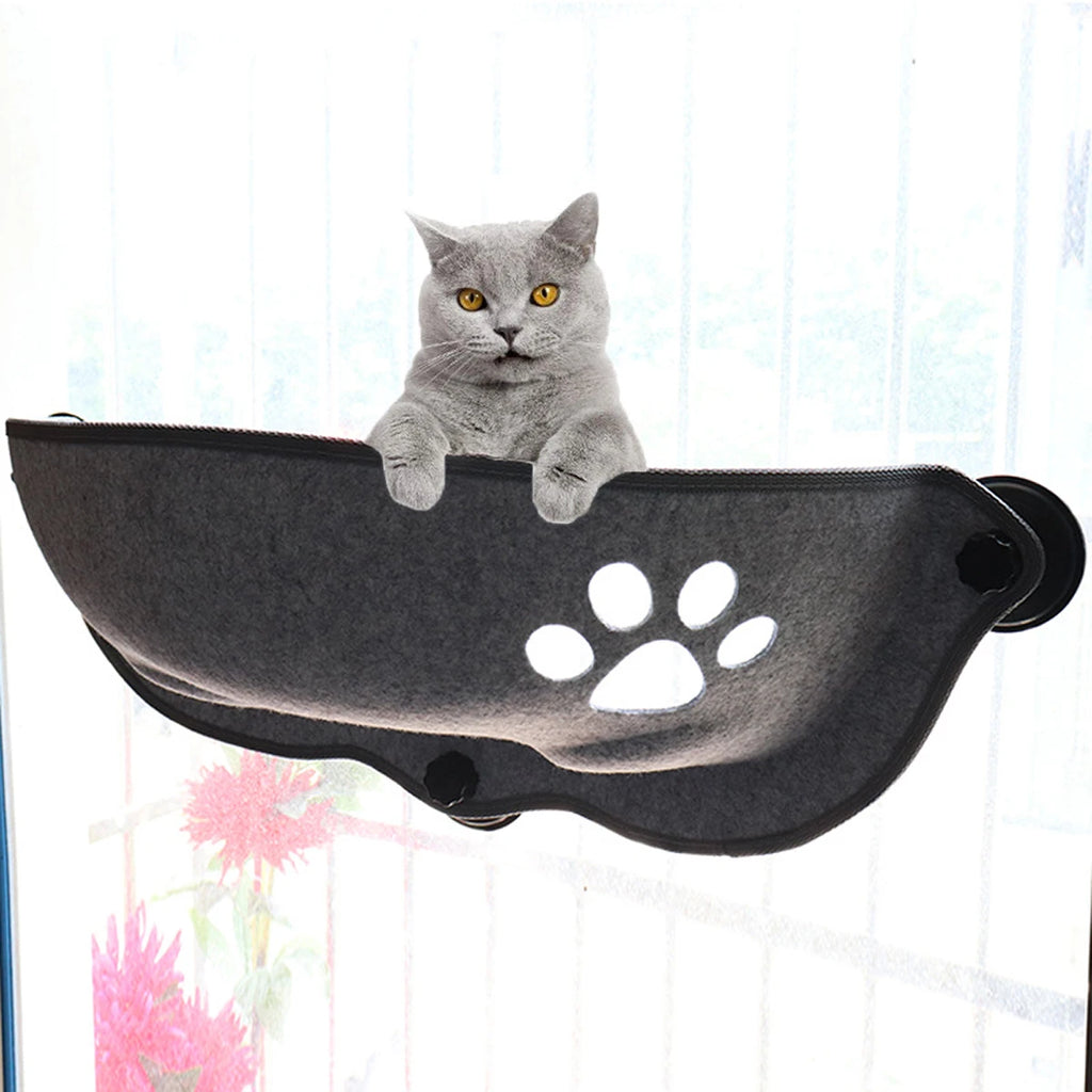 Shuangmao Cat Window Hammock in coral fleece, cozy pet bed lounger for cats up to 20kg, shown attached to a window.