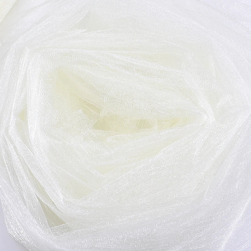 White sheer organza tulle fabric roll from Showlu Fashion Store, ideal for wedding arches, backdrops, and event decorations.