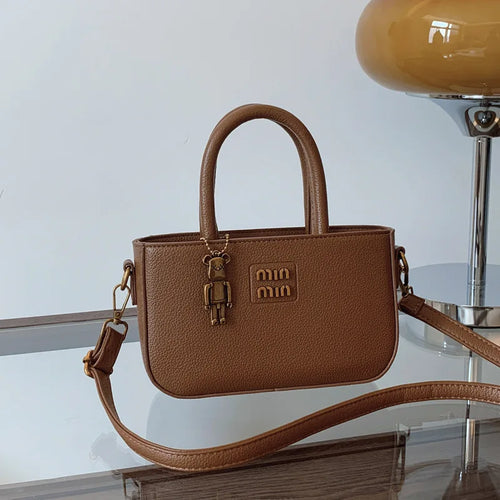 2025 minimalist luxury phone pouch shoulder crossbody bag by 1170uf-he, featuring sleek design and compact storage.