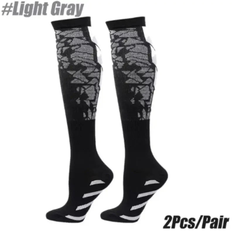 Showlu knee-high compression sports socks in nylon with calf support, ideal for running and athletic activities.