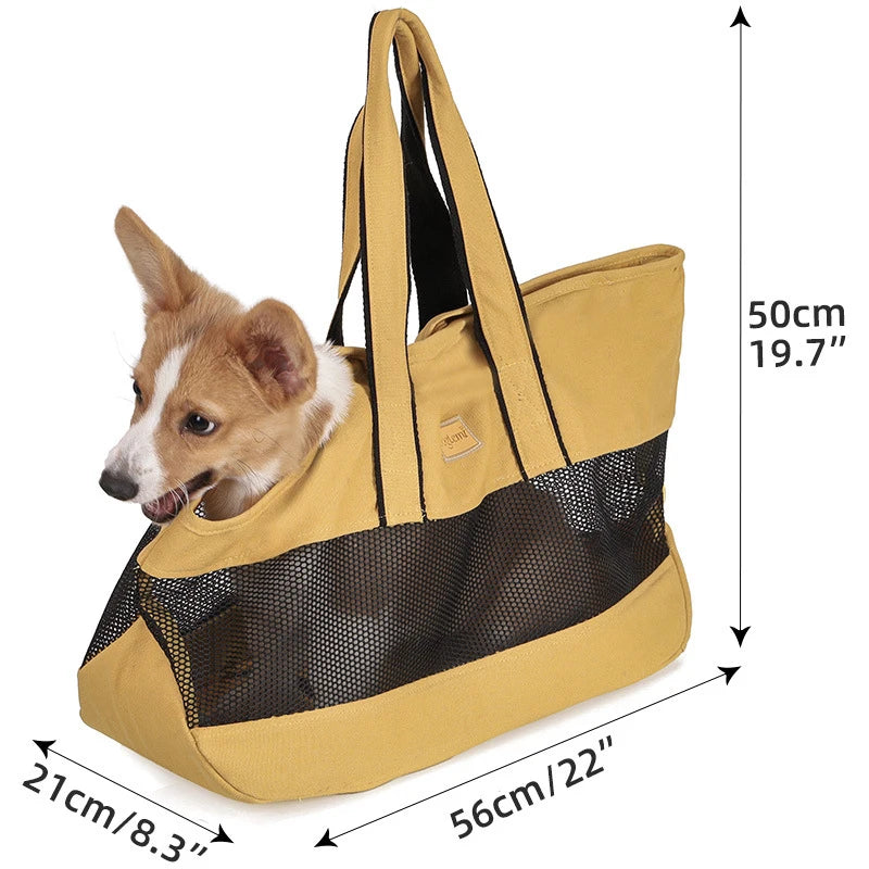 Breathable mesh pet carrier by Showlu Fashion Store, foldable canvas shoulder bag for cats with ventilation and comfortable design.