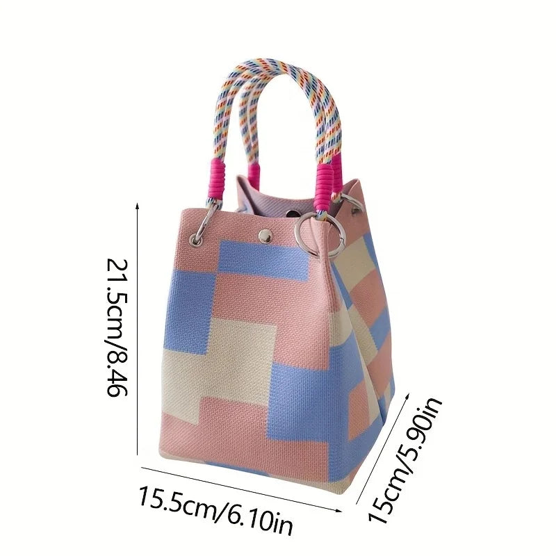 Women's vintage floral knit tote bag with adjustable straps, metal rings, and snap closure, ideal for casual travel and storage.
