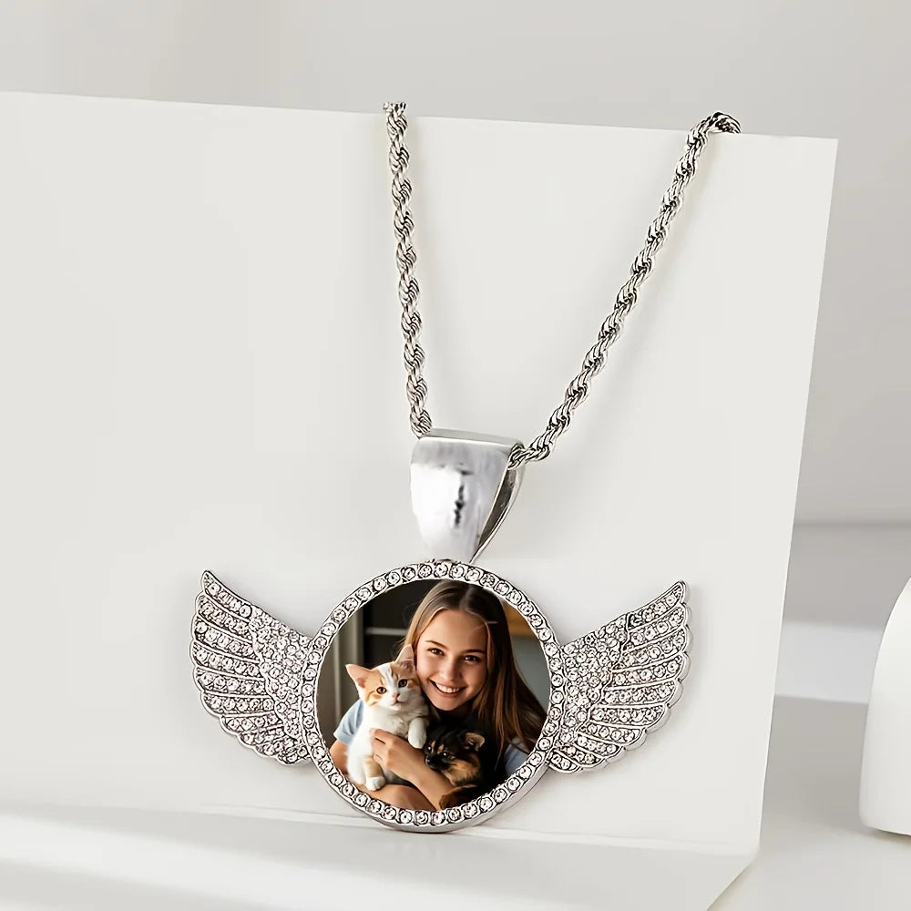 Custom angel wing photo necklace by Showlu featuring zinc alloy memory pendant with intricate wing details.