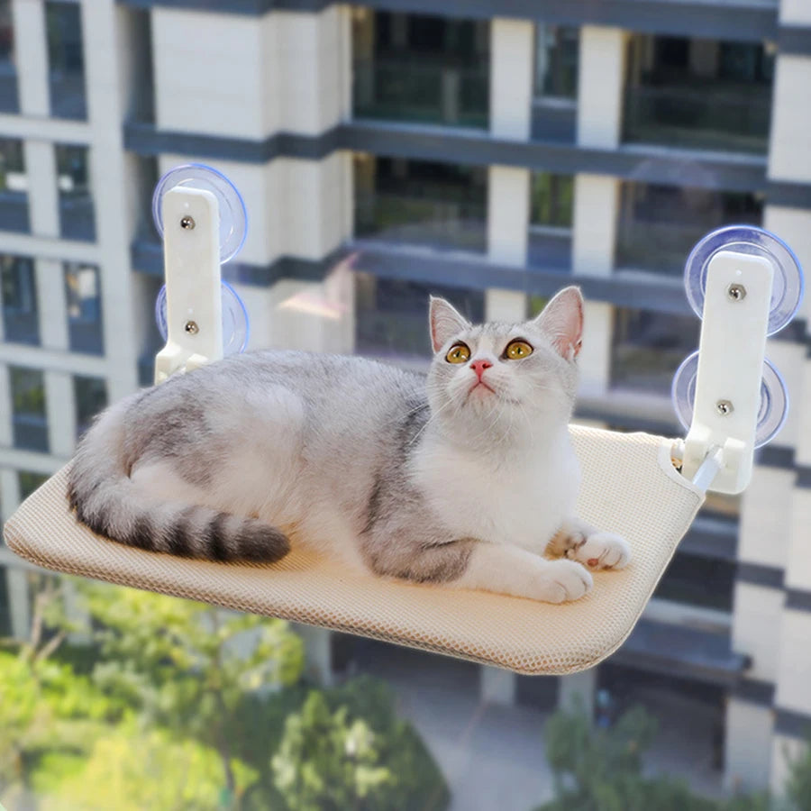 Showlu Folding Cat Window Hammock with breathable mesh, serving as a cozy jumping platform for cats to relax by the window.
