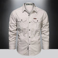 Men's SHOWLU cotton cargo shirt with long sleeves, multiple pockets, military style overshirt, casual and functional design.