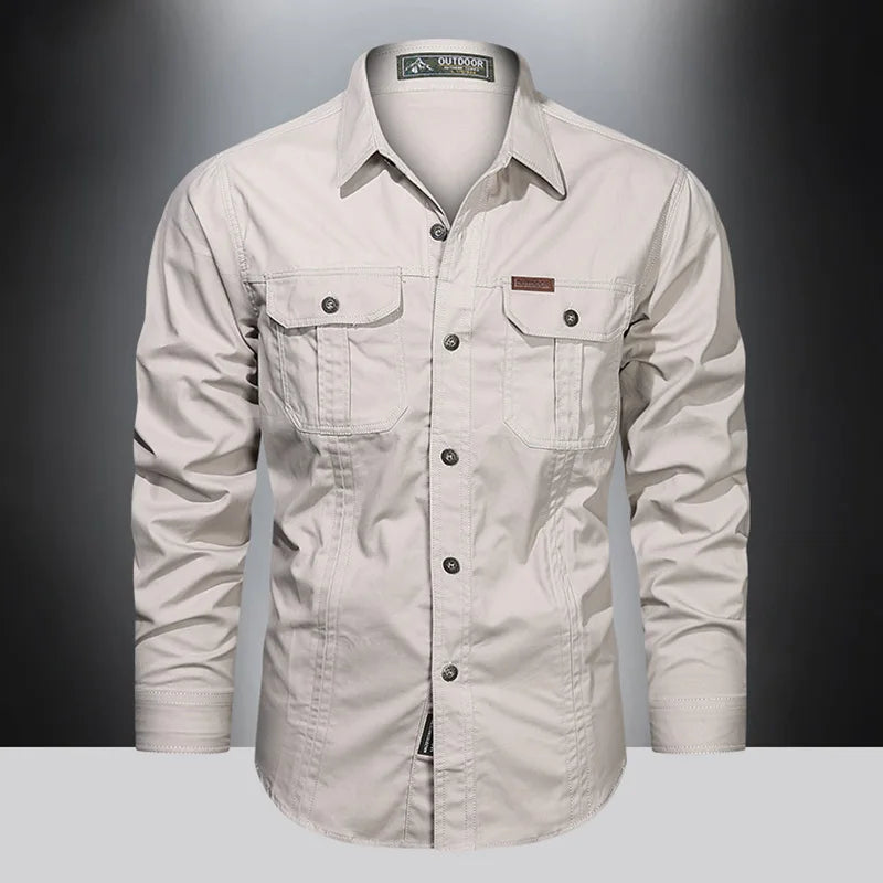 Men's SHOWLU cotton cargo shirt with long sleeves, multiple pockets, military style overshirt, casual and functional design.