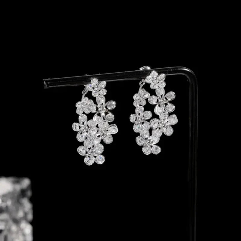 SHOWLU FASHION zircon leaf stud earrings featuring Korean-style copper jewelry with intricate leaf design.