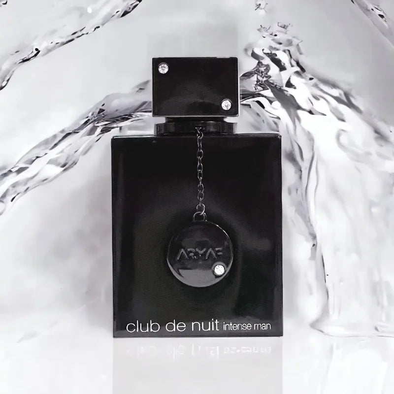 Armaf Club De Nuit 2-piece set featuring woody Eau de Parfum spray in 105ml bottle, showcasing the elegant fragrance design
