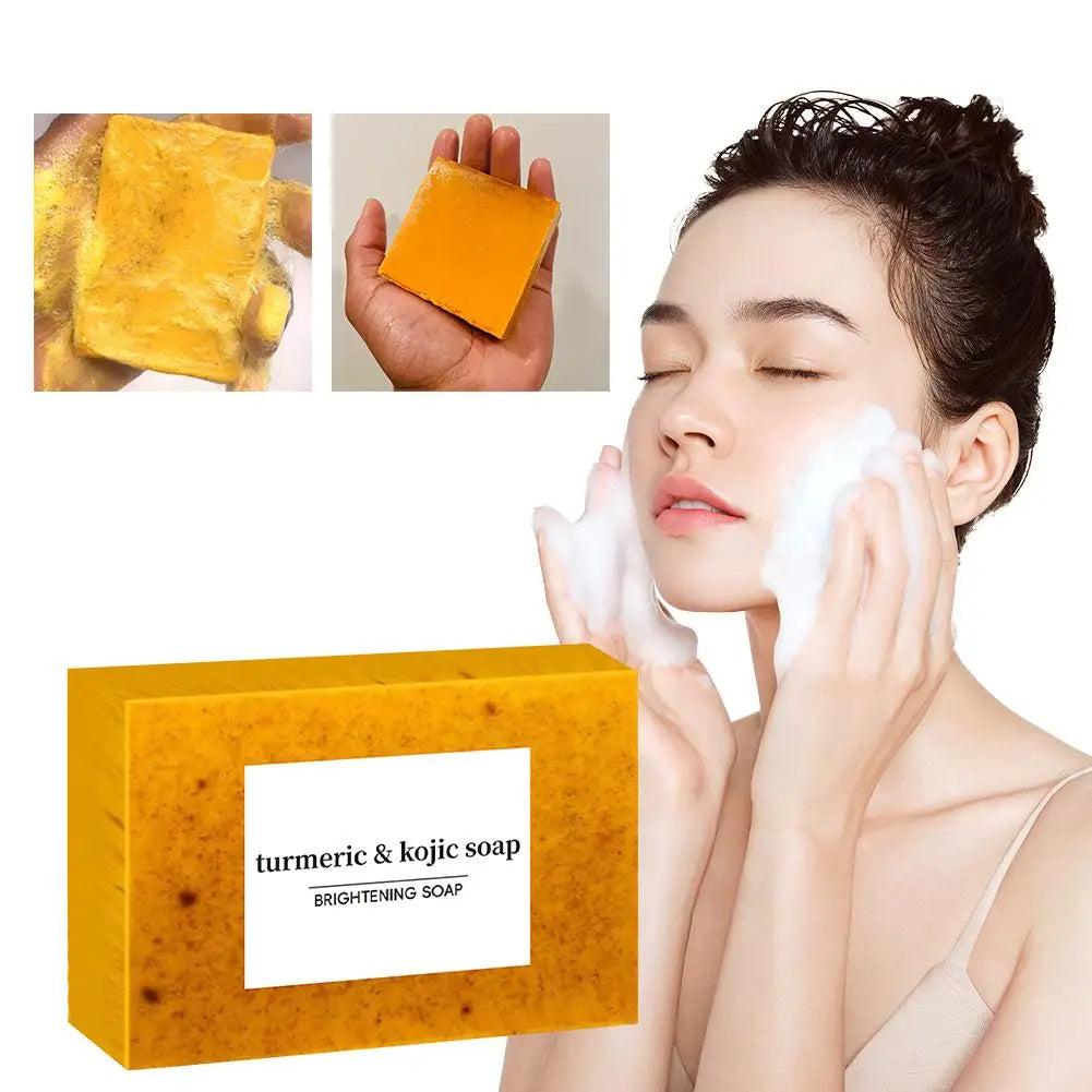 Handmade turmeric and lemon kojic acid soap bar, Showlu Fashion, for shower and facial skin care, displayed in a stack of multiple pieces.