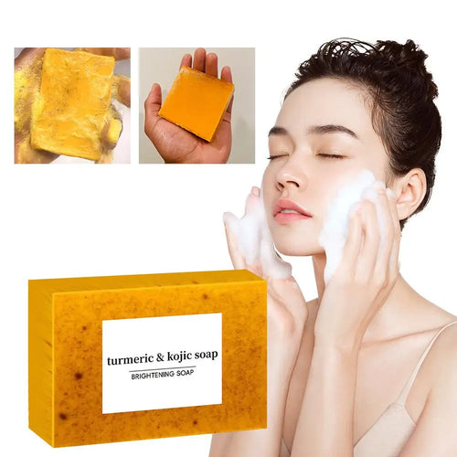 Handmade turmeric and lemon kojic acid soap bar, Showlu Fashion, for shower and facial skin care, displayed in a stack of multiple pieces.
