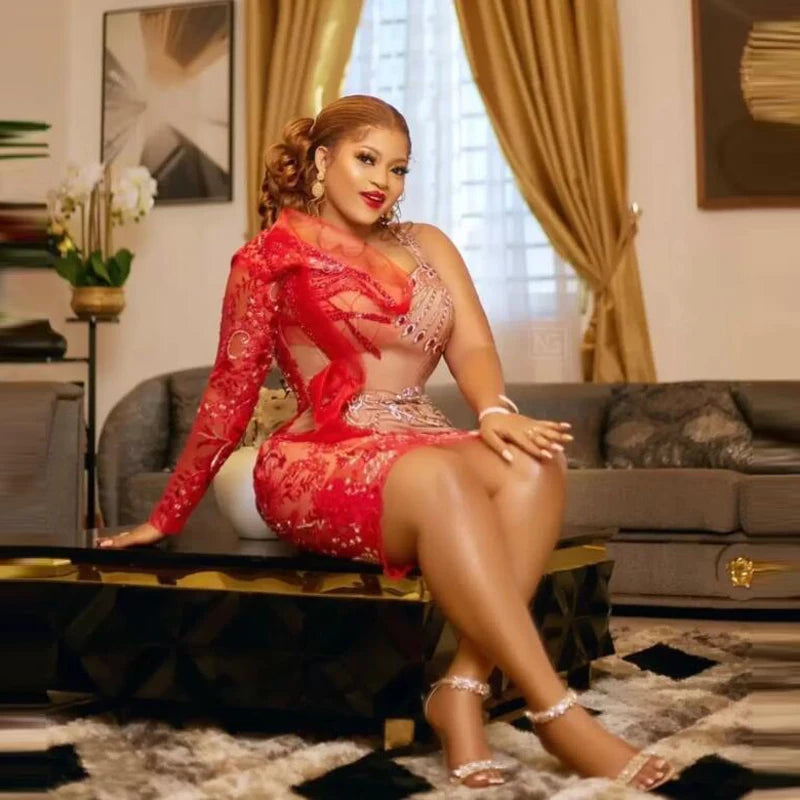 Red one-shoulder prom dress by Showlu Fashion, sweetheart neckline, beaded crystals, knee length, suitable for parties and birthdays.
