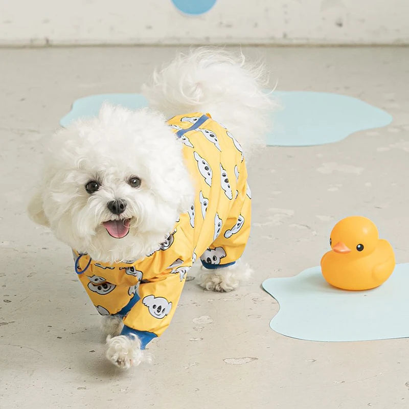 Showlu waterproof hooded dog raincoat with four legs, designed for full coverage and protection during rainy weather.