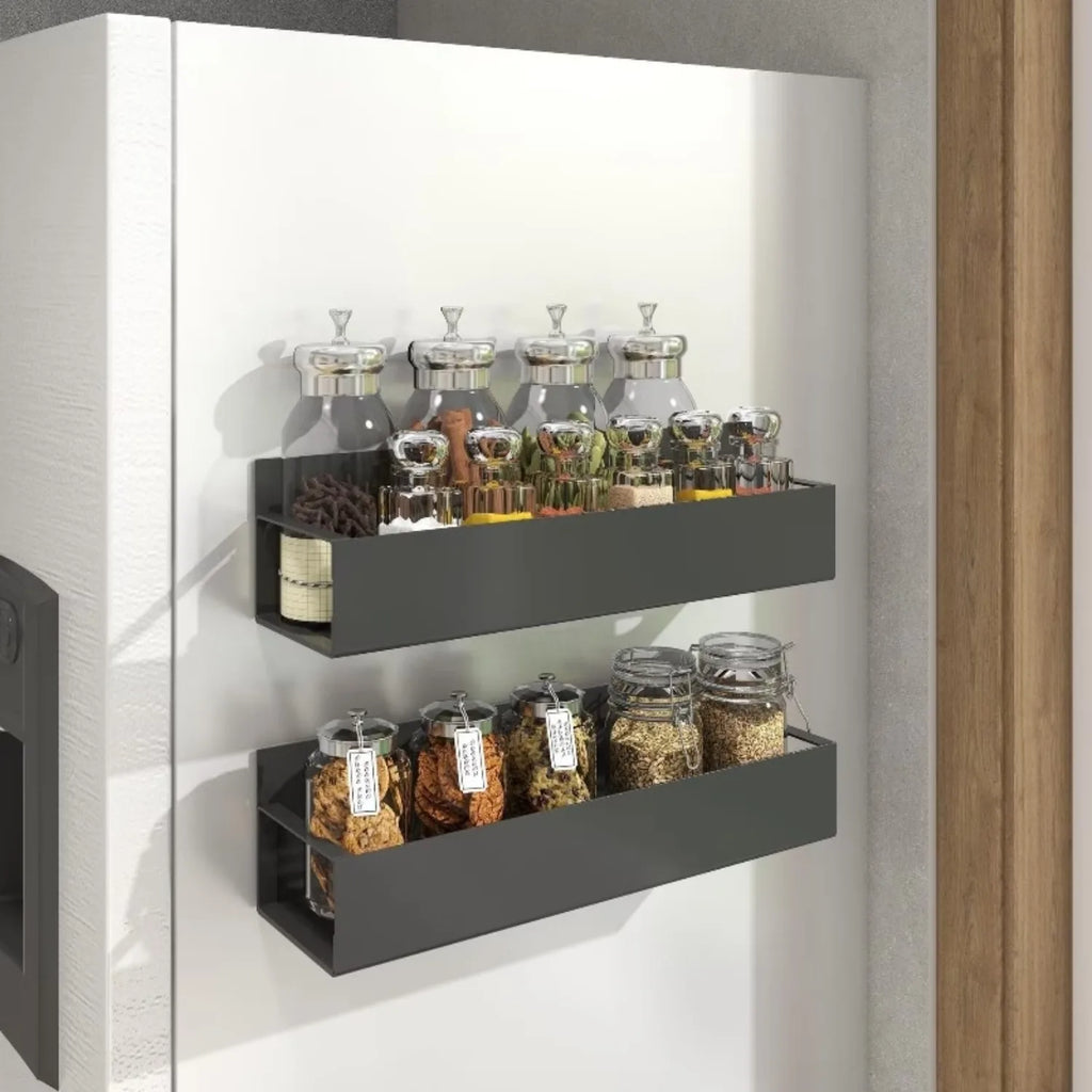 Magnetic fridge spice rack by Showlu Smart General holding various spice jars on a kitchen fridge door