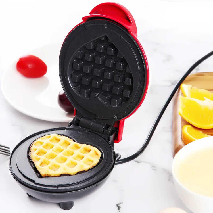 Mini electric waffle maker by Showlu Smart General with non-stick surface and 350W power, compact and easy to use.