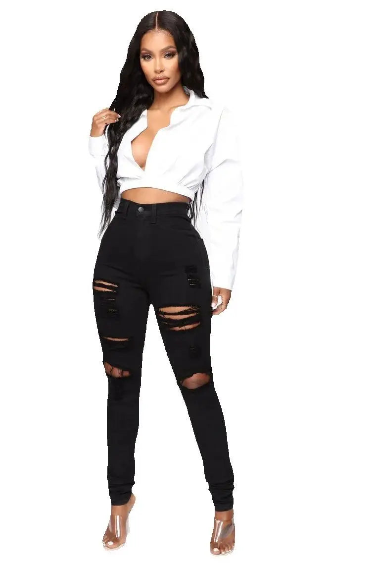 Black and white ripped skinny denim jeans for women, showing casual street style with stretch fabric and distressed details.
