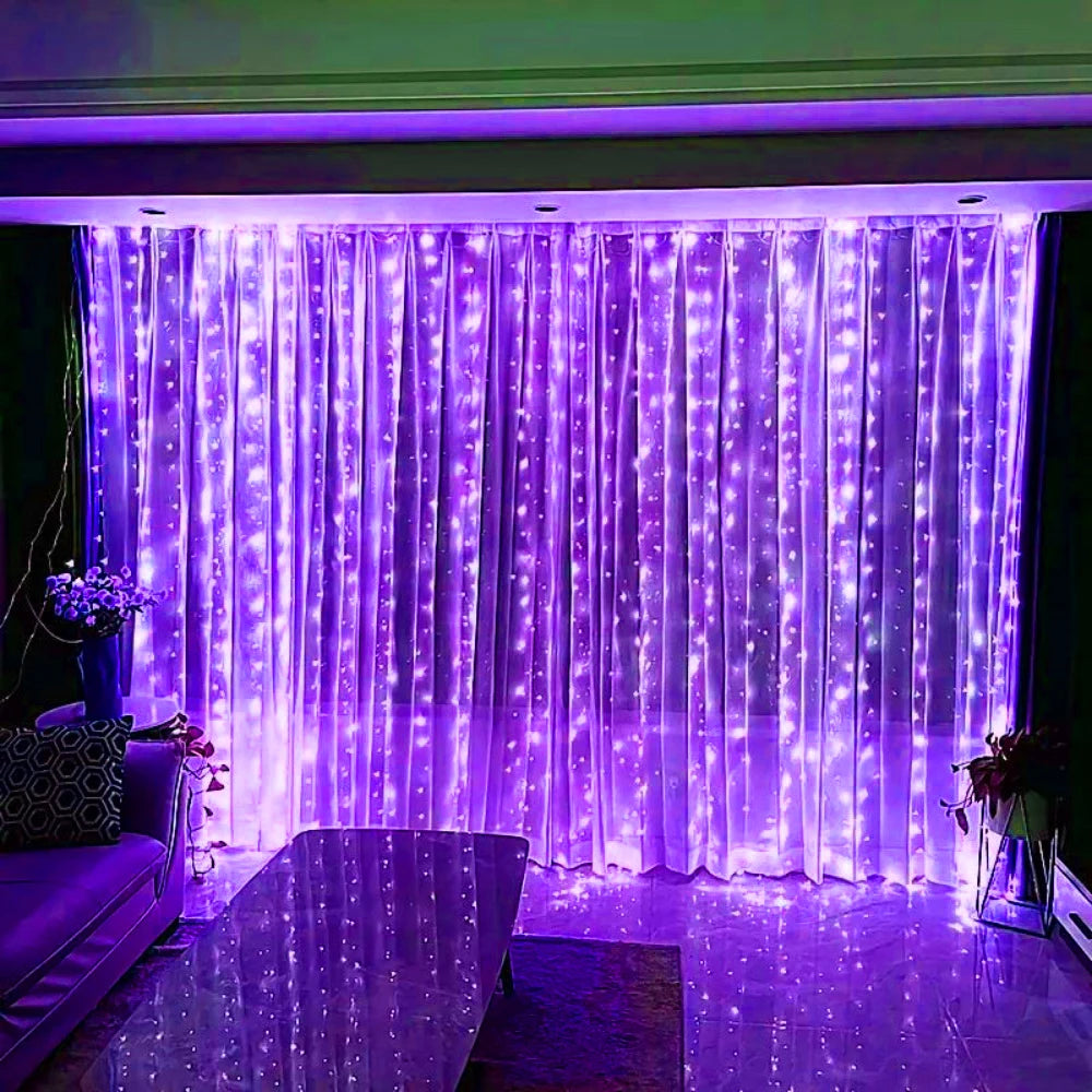 Showlu Smart General LED curtain fairy lights hanging in a room, creating a cozy and decorative ambiance with warm glowing bulbs.