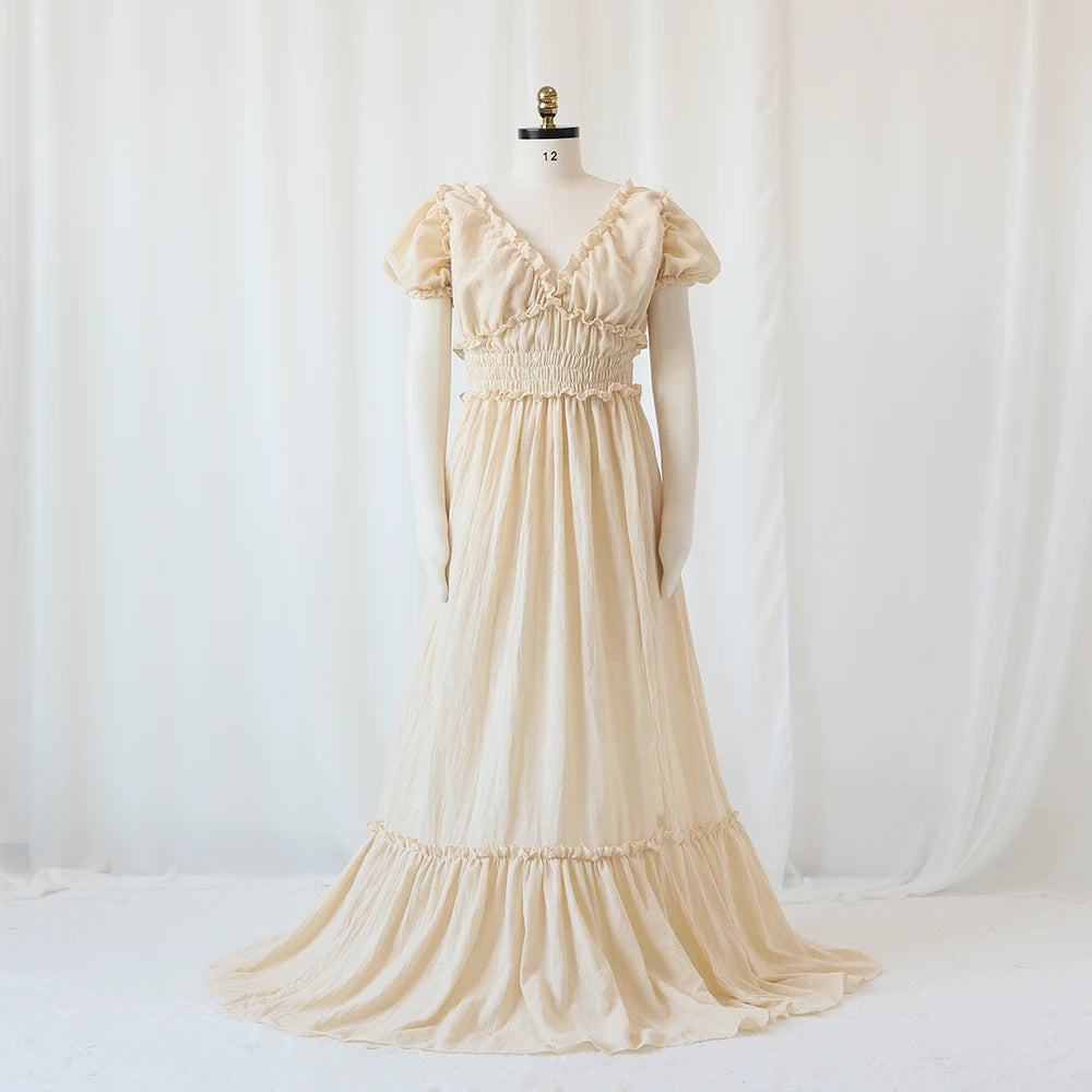 Showlu Bohemian maternity maxi gown with off-shoulder ruffled design, perfect for photos and special occasions.