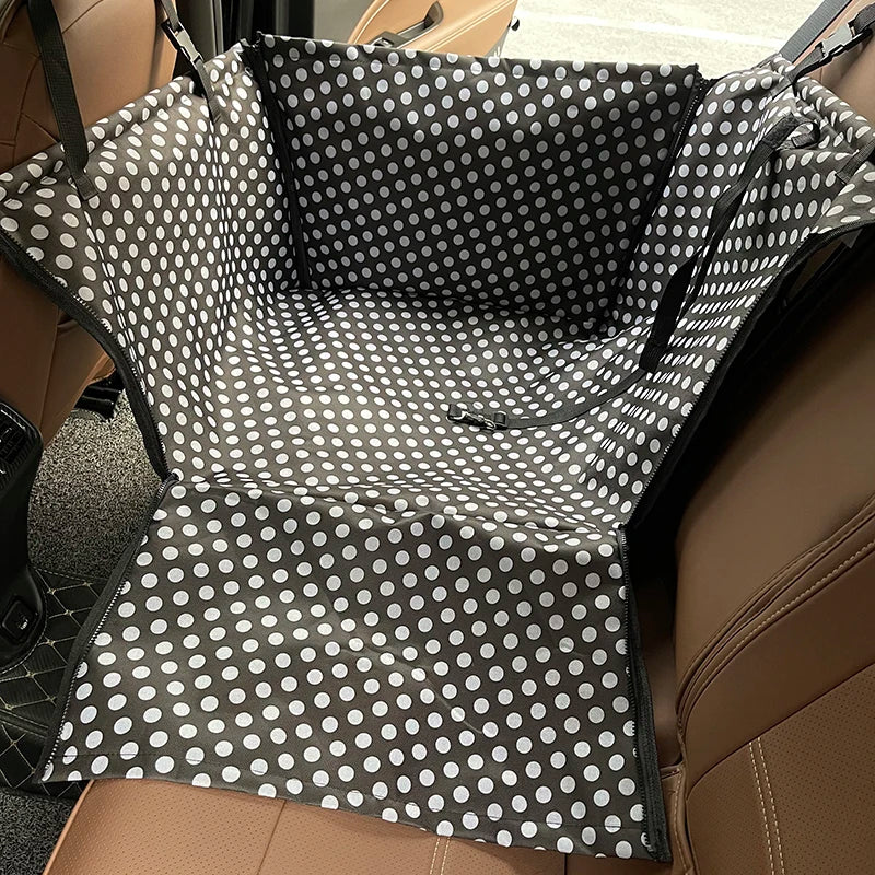 Waterproof Cawayi Kennel Dog Car Seat Cover by Showlu Fashion Store, showing a durable, quilted pet travel hammock in a car seat.