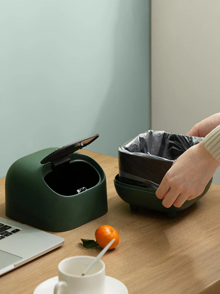 Mini bathroom trash can by Showlu Smart General, compact waste bin with lid for bathroom organization and cleanliness.