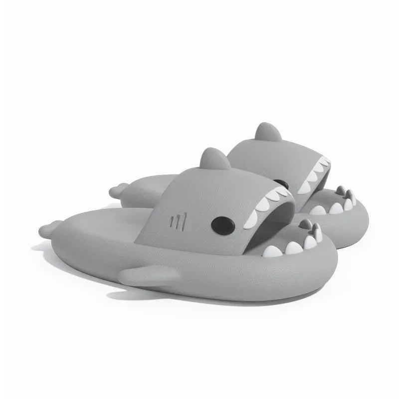 SHOWLU Shark slippers in blue, anti-skid summer slides for kids and adults, featuring shark design and comfortable slip-on style.
