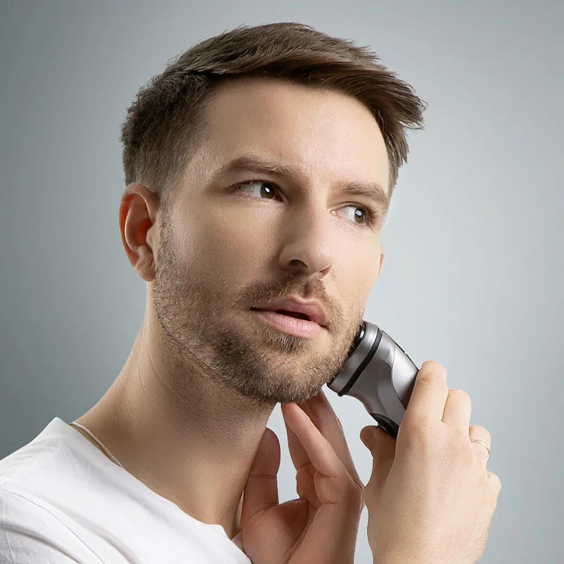 Showlu Smart General ENCHEN Blackstone 3D Rotary Electric Shaver with multiple rotary blades and ergonomic handle.